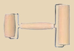 Double-ended ceramic roller tool with a central handle, used for rolling clay and evenly applying glazes.