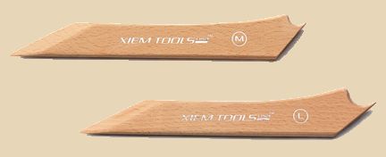 Two wooden Xiem Tools modeling tools, one medium and one large, designed for shaping clay and pottery.