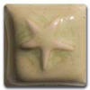Cream-colored ceramic tile with a star relief design, showcasing textures ideal for decorative pottery or sculptural work.