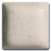 Ceramic swatch of a smooth, off-white glaze, showcasing a subtle texture ideal for pottery decoration and finishing.
