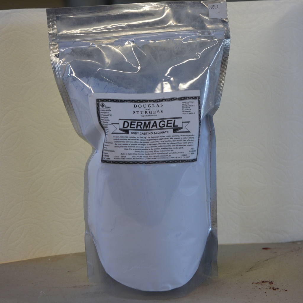 Bag of Dermagel body casting alginate by Douglas Sturgess on a table, suitable for ceramic sculpting and casting techniques.