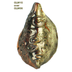 GLW15 + GLW06 Ceramic glaze sample showing GLW15 over GLW06 with intricate designs and metallic hues, highlighting decorative pottery techniques.