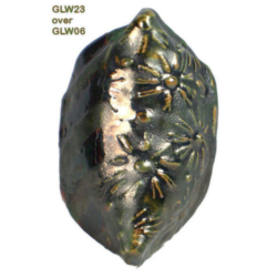 GLW23 + GLW06 Textured ceramic piece coated with GLW23 glaze over GLW06, showcasing a dark green finish with floral designs.